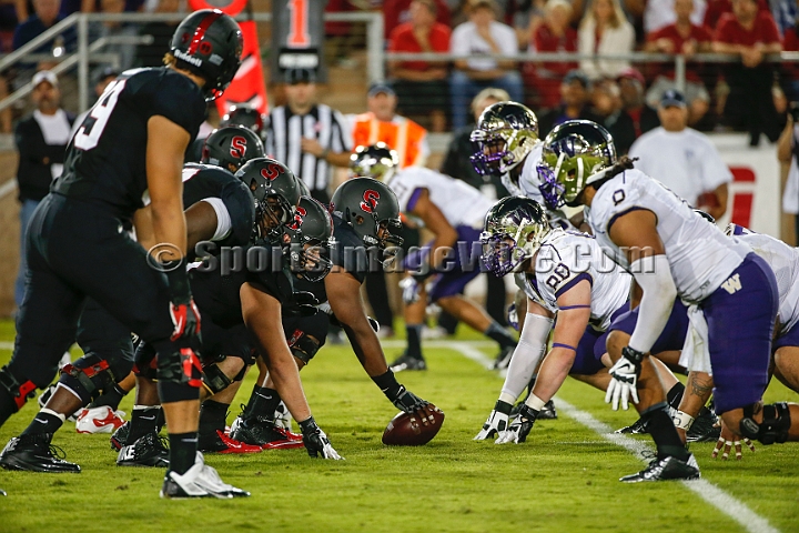 2013Stanford-Wash-055.JPG - Oct. 5, 2013; Stanford, CA, USA; General view of line of scrimmage Stanford Cardinal center Khalil Wilkes prepares to snap the ball against the Washington Huskies at  Stanford Stadium. Stanford defeated Washington 31-28.
